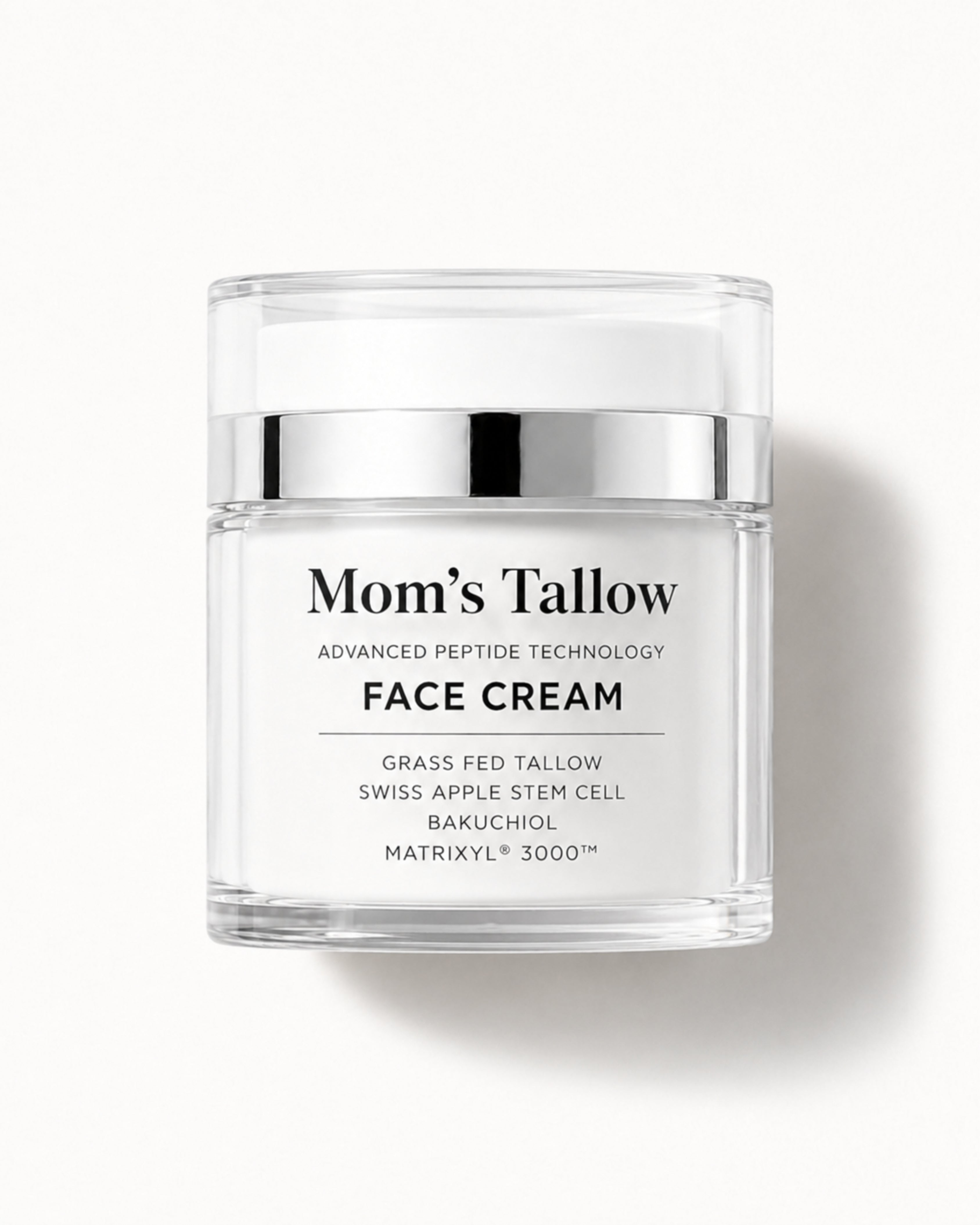 Mom’s Tallow Advanced Peptide Face Cream with grass-fed tallow in a clear jar on an off-white background